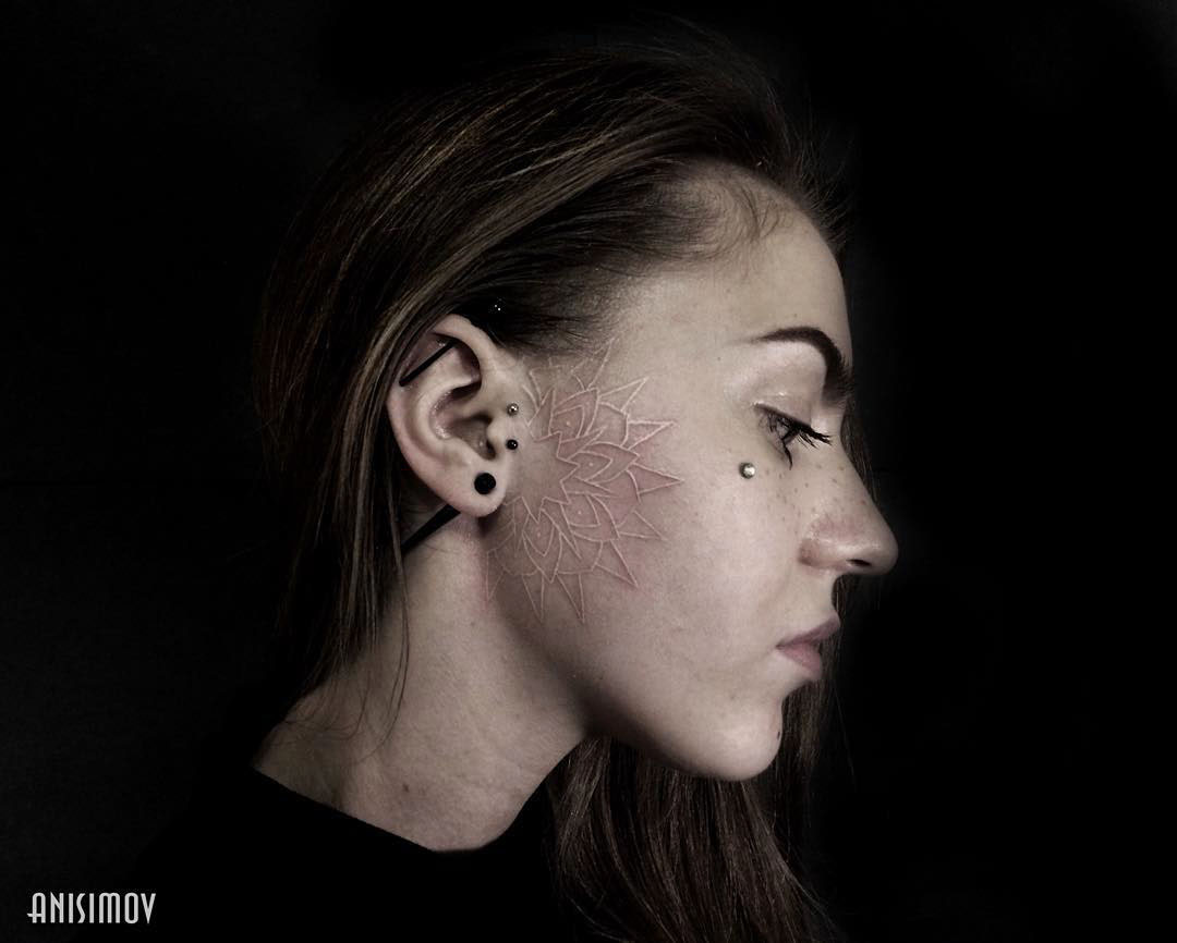 Girl With Face Tattoo by Ilya Anisimov