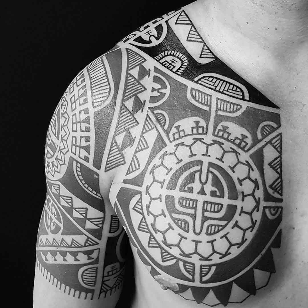 chest to shoulder sleeve polynesian tattoo.