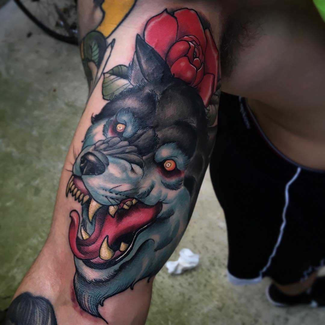 wolf tattoo on bicep