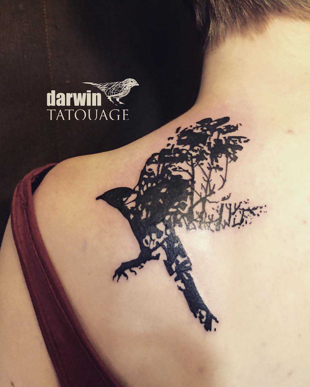 shoulder blade bird tattoo