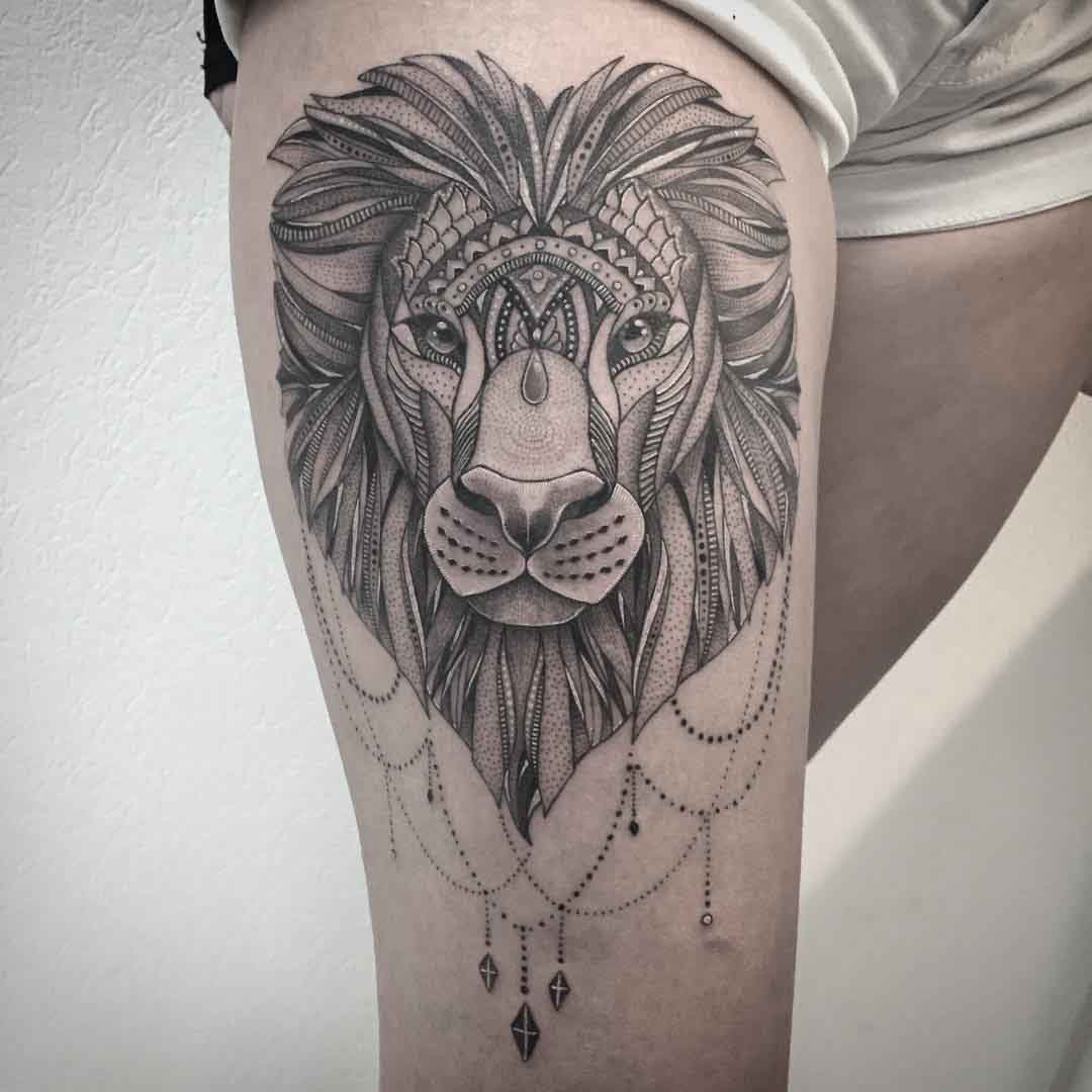 mehndi lion tattoo on thigh for girls