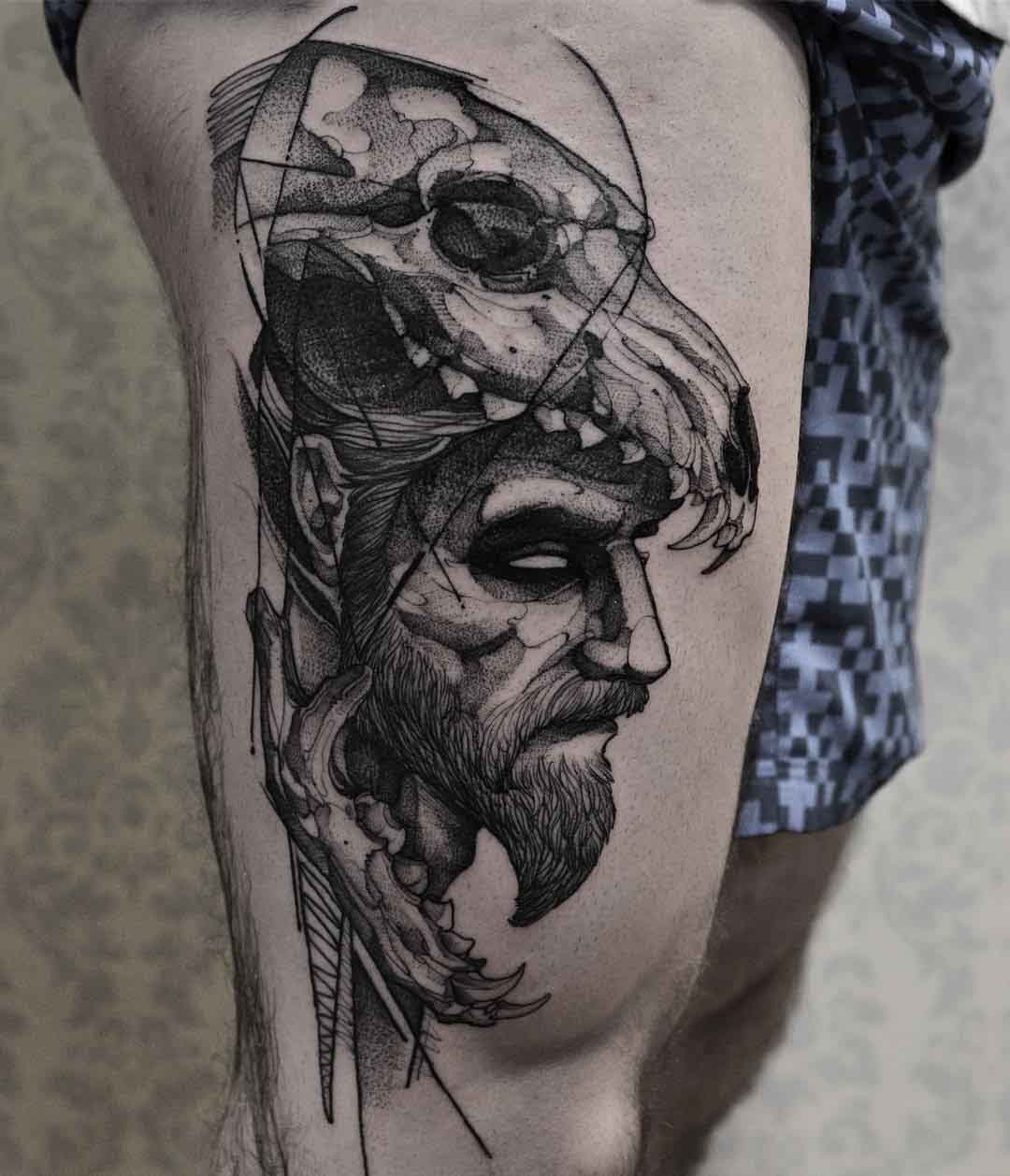 thigh tattoo man in a wolf skull