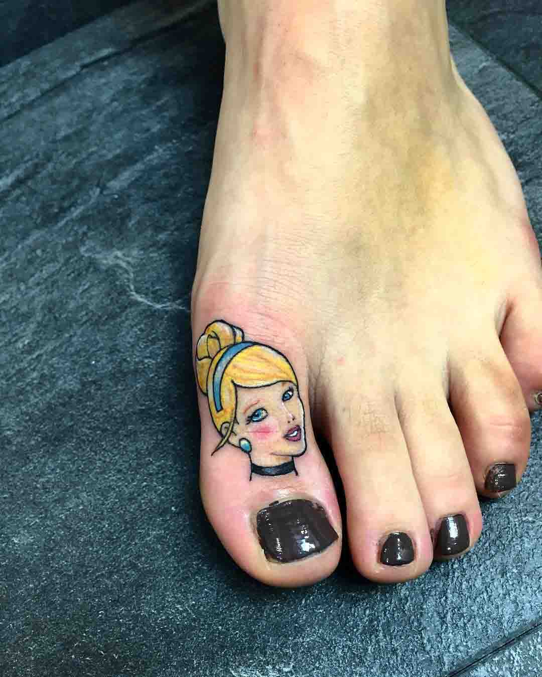 toe tattoo thumb face. 