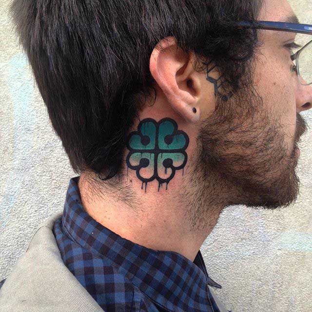 behind the ear clover tattoo upper neck side