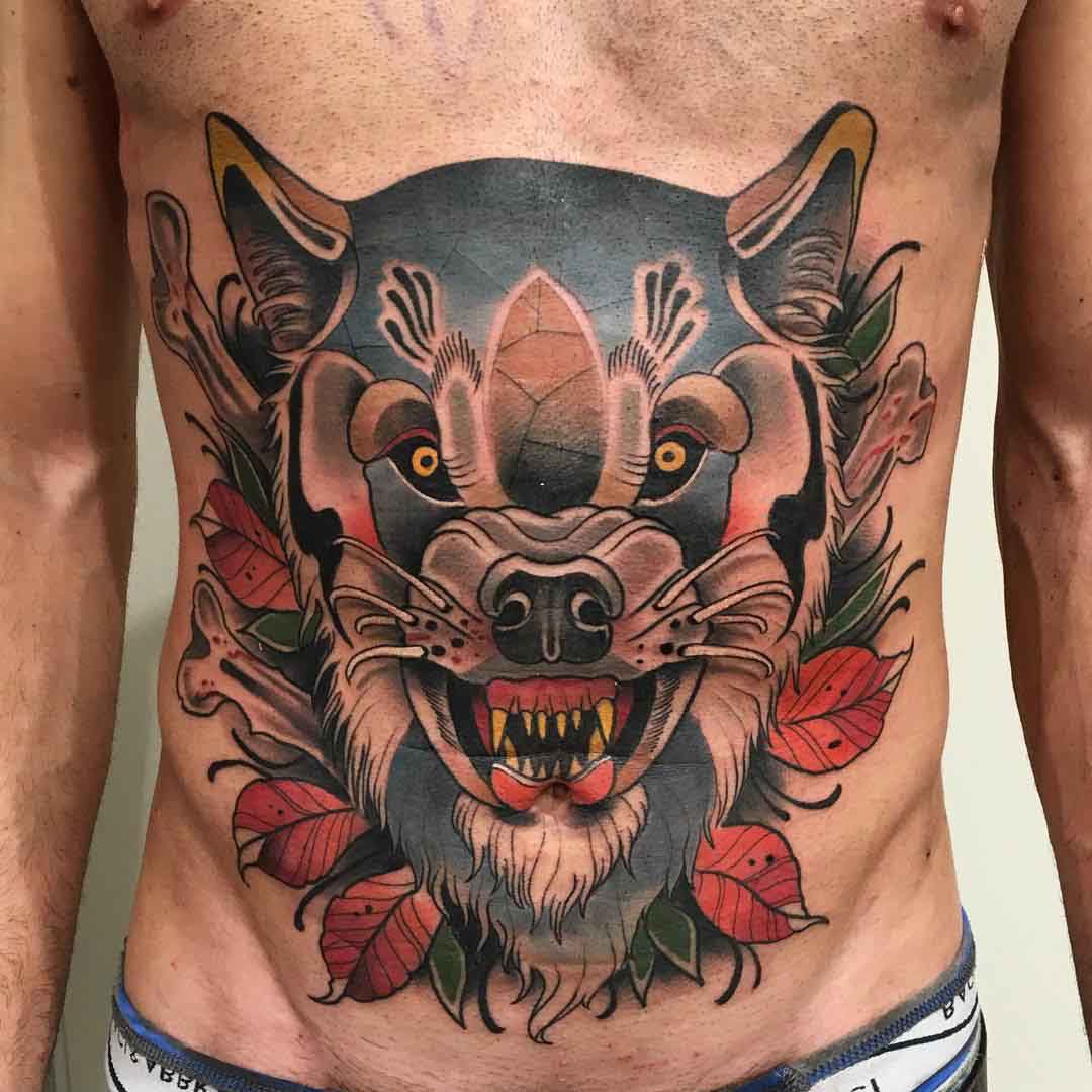neo-traditional old school tattoo wolf on stomach