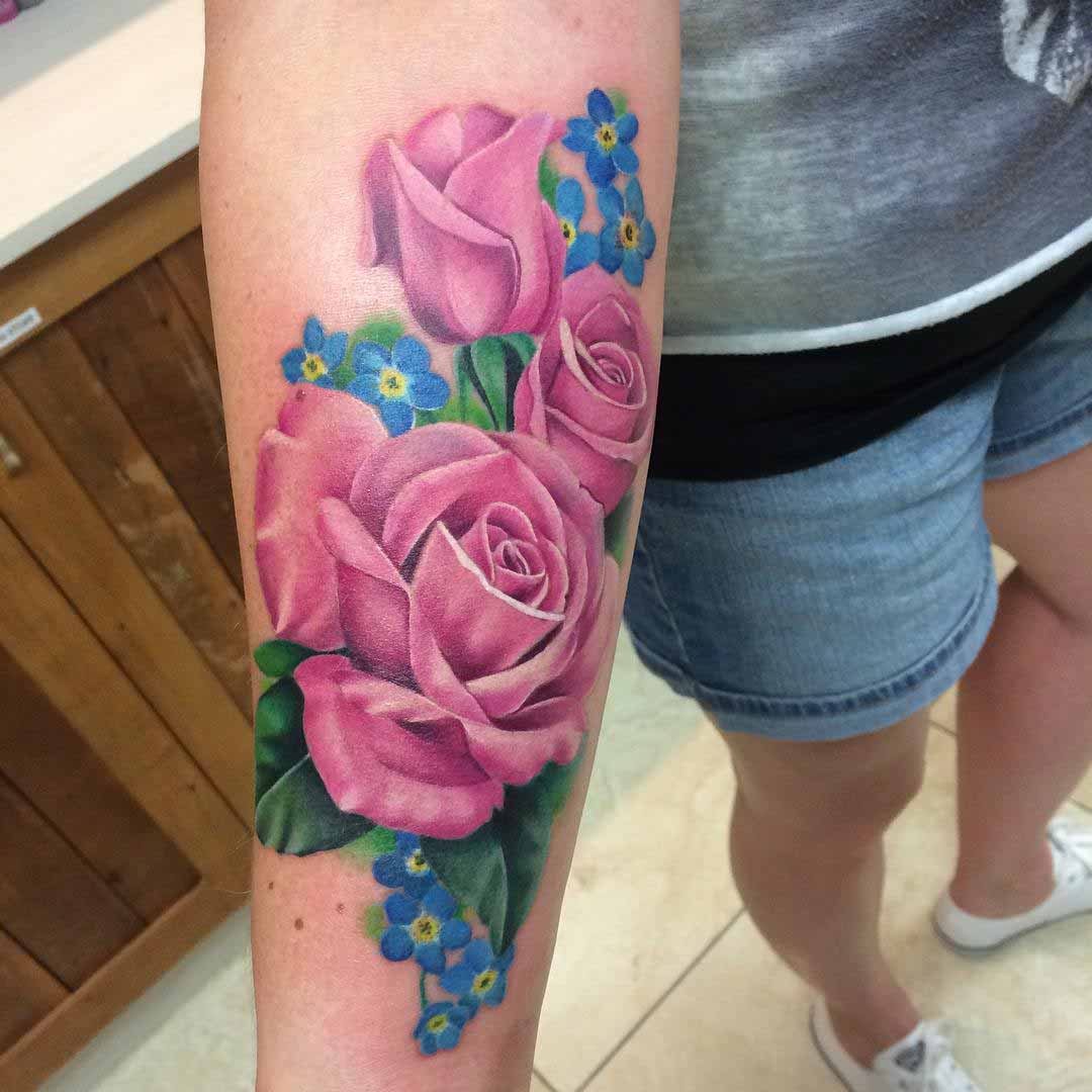 roses tattoo on forearm