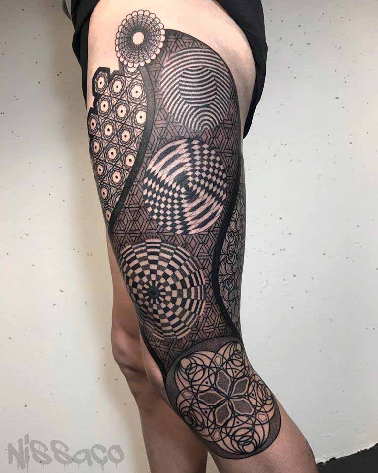 geometric leg tattoo on thigh and hip