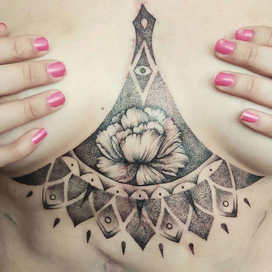 flower tattoo under breast