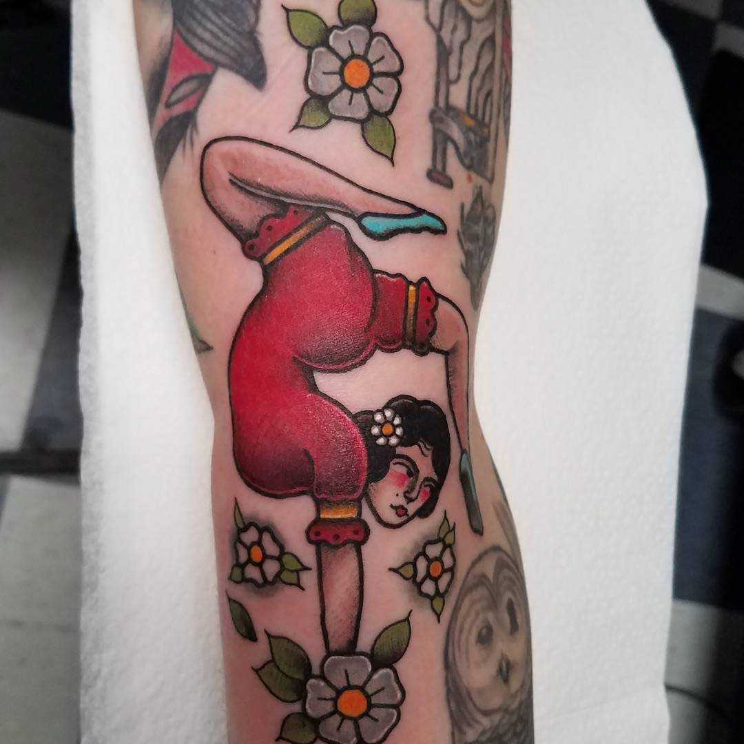 gymnast traditional tattoo on arm