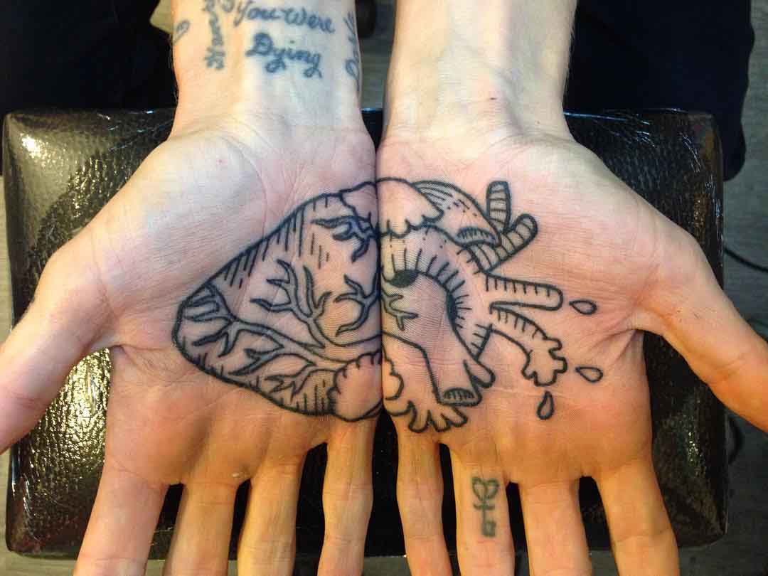Matching Heart Tattoo on Palms by Elijah Pashby