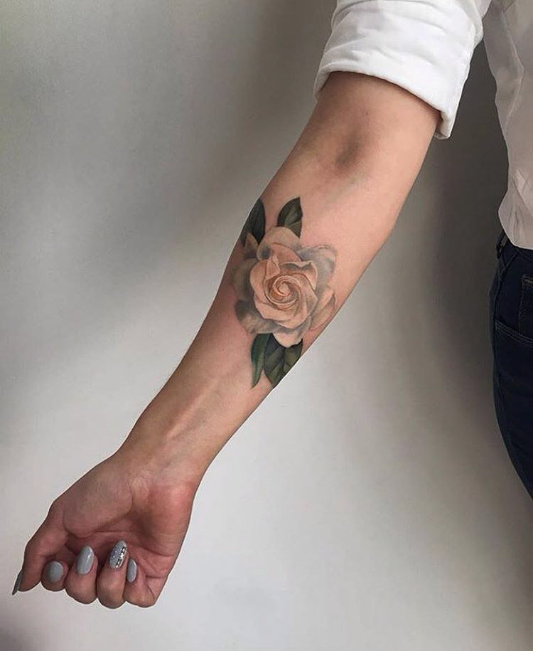 forearm tattoo of rose