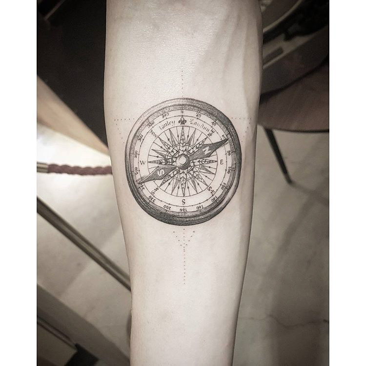 arm tattoo compass