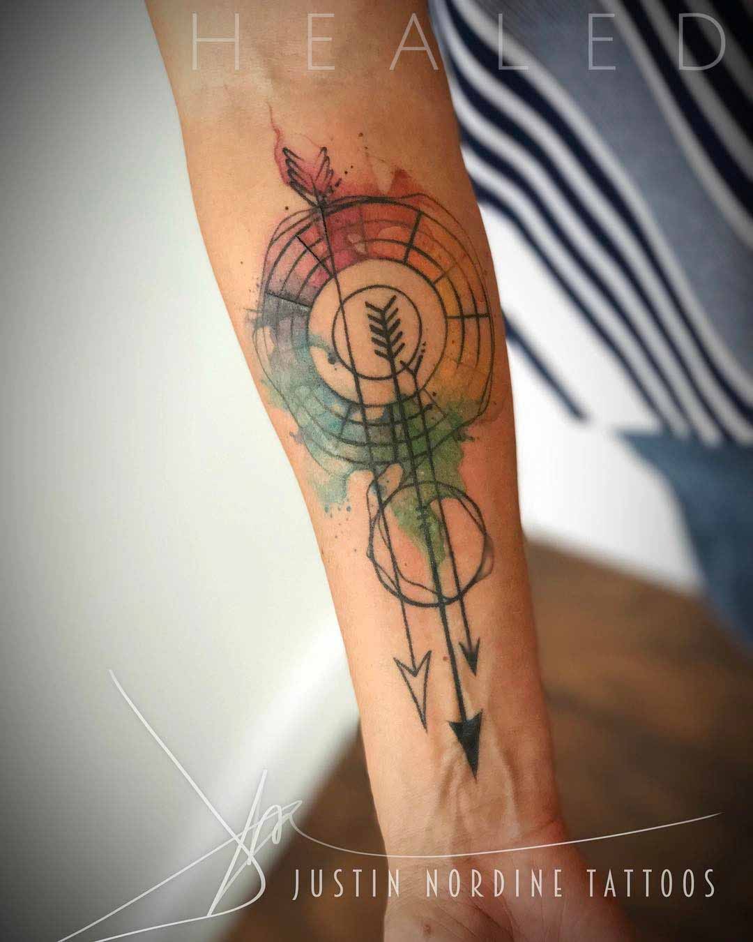 geometry tattoo arrows on forearm