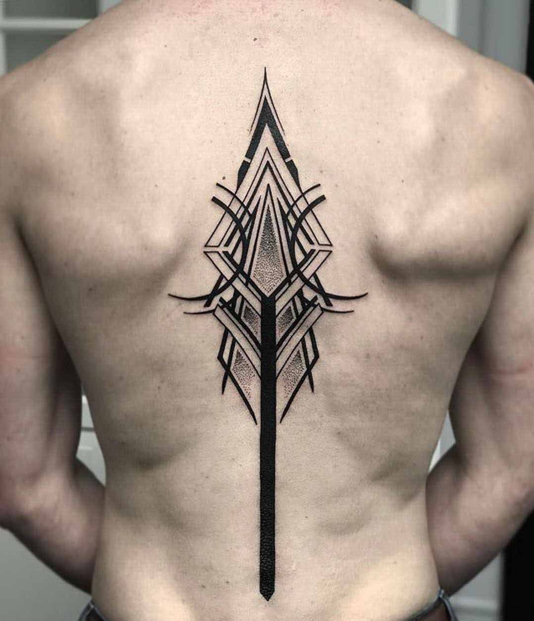 sumbolic spine tattoo