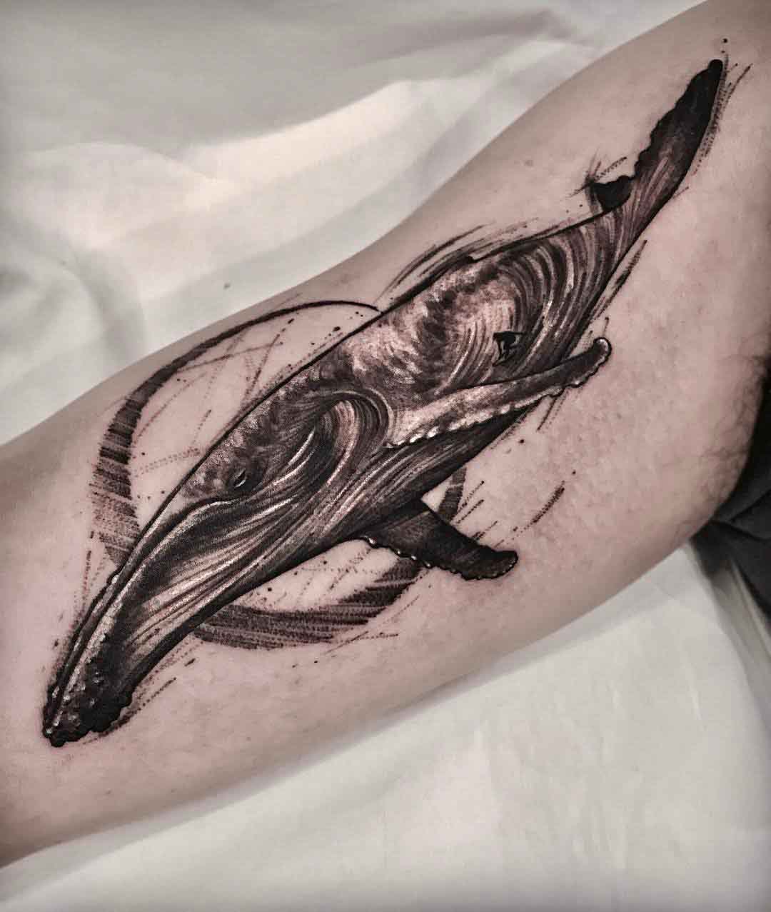 arm tattoo whale with waves