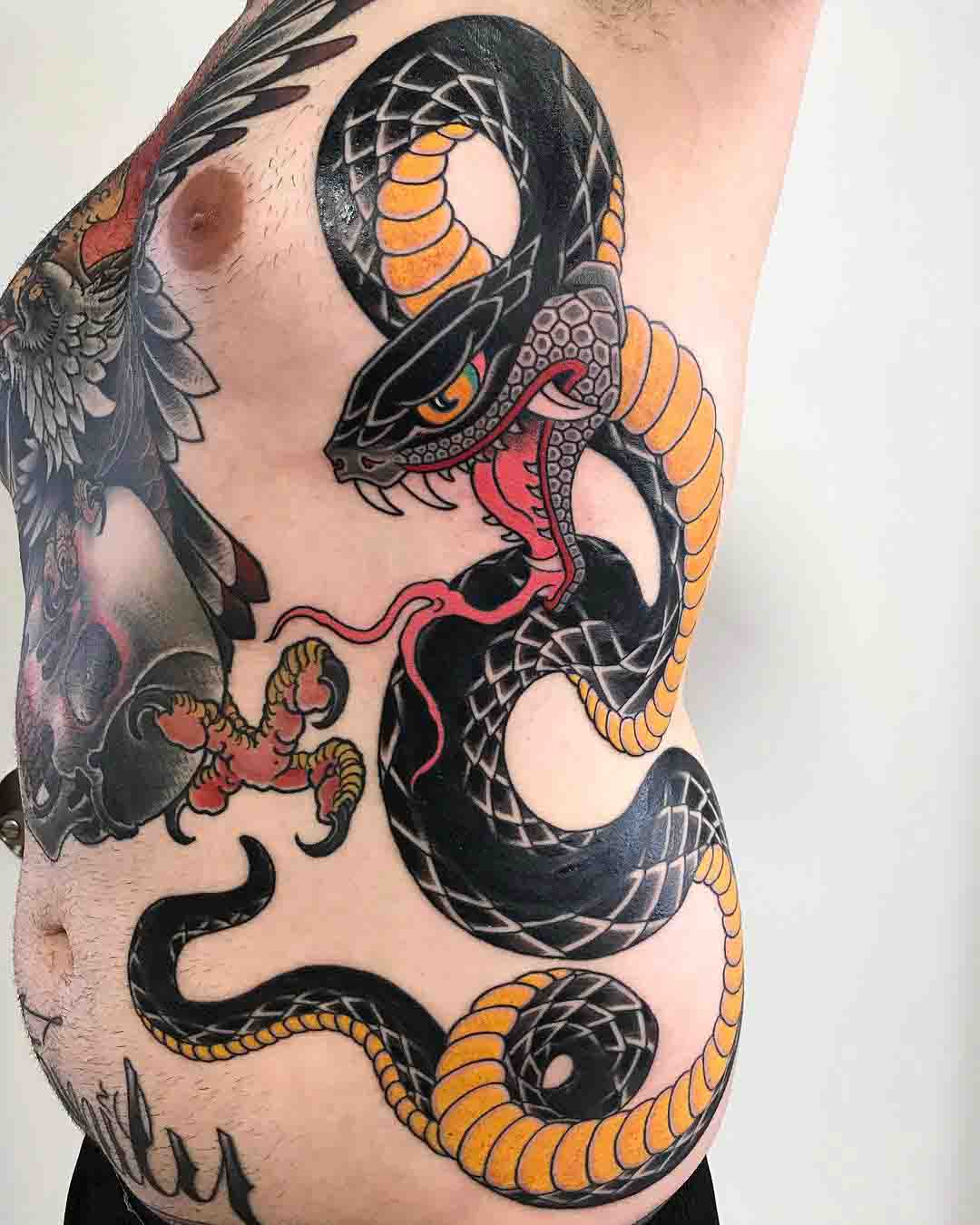 side tattoo black snake