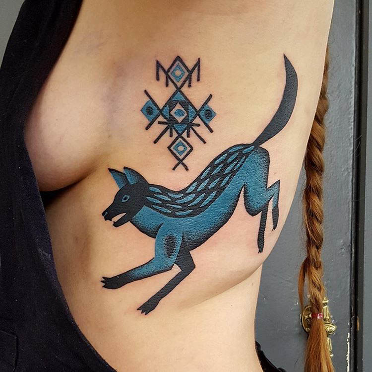 rib tattoo blue fox norwegian style
