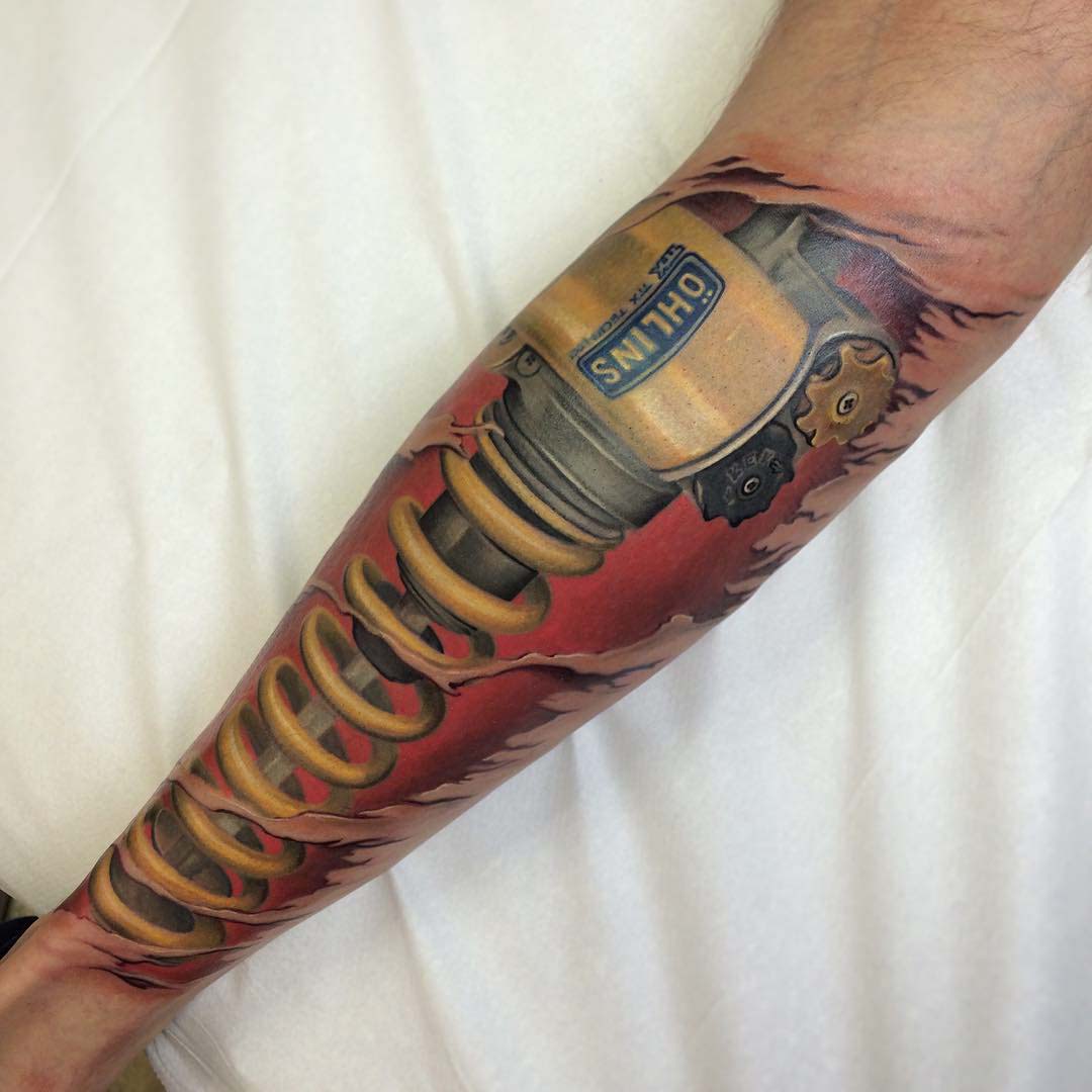 arm tattoo piston