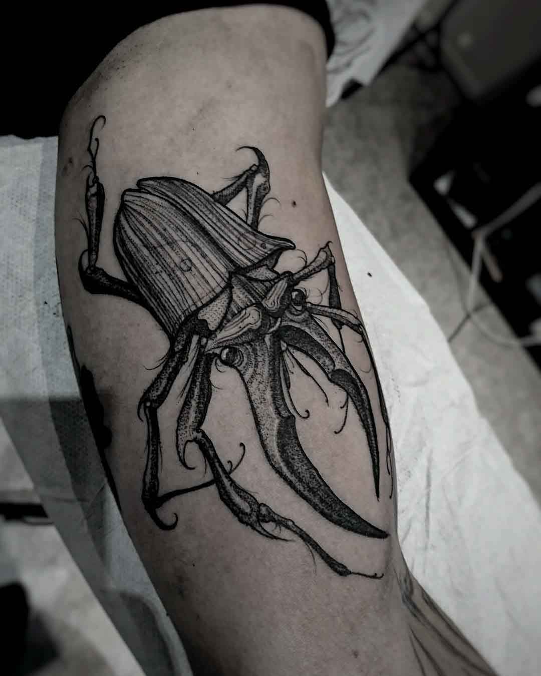 bicep tattoo stag beetle