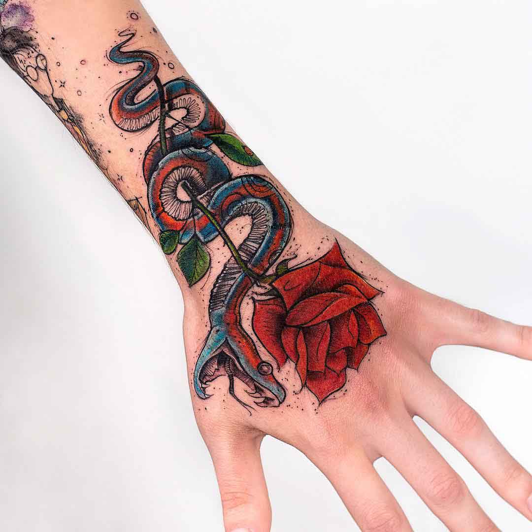 arm tattoo snake rose