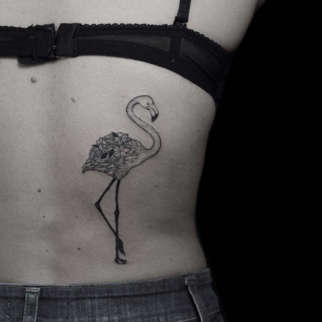 floral flamingo tattoo on back side