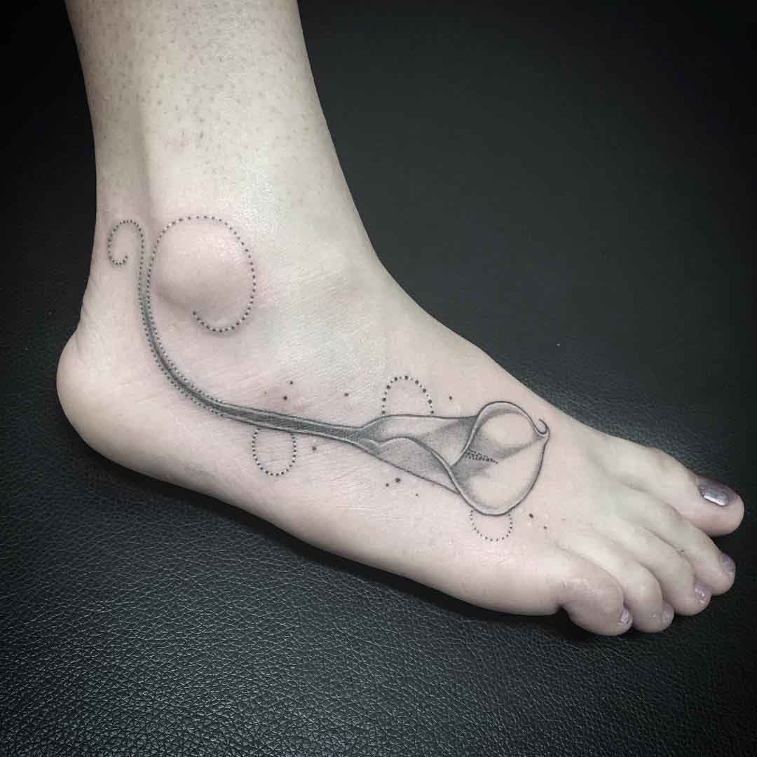 foot tattoo flower