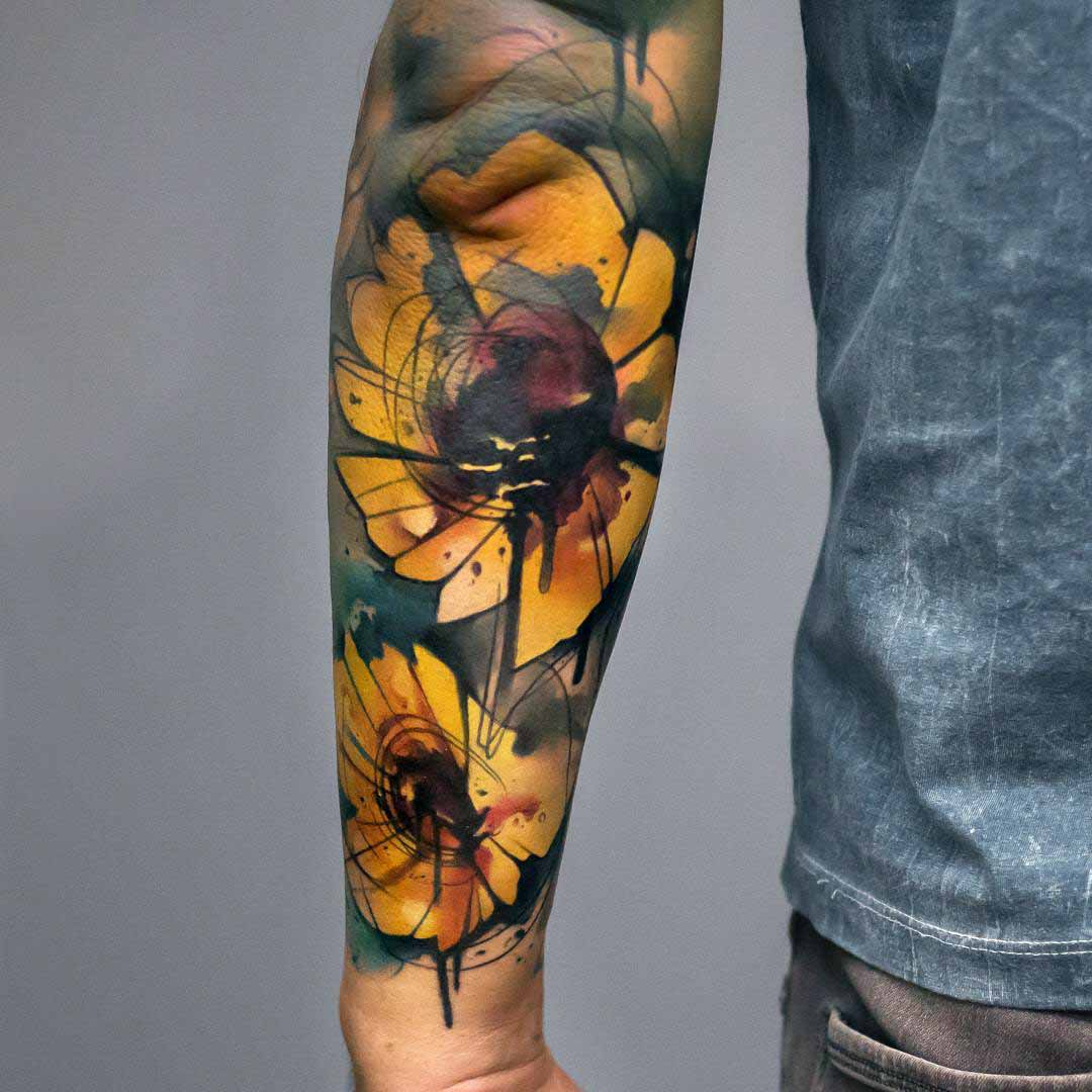 forearm sunflowers tattoo watercolor style
