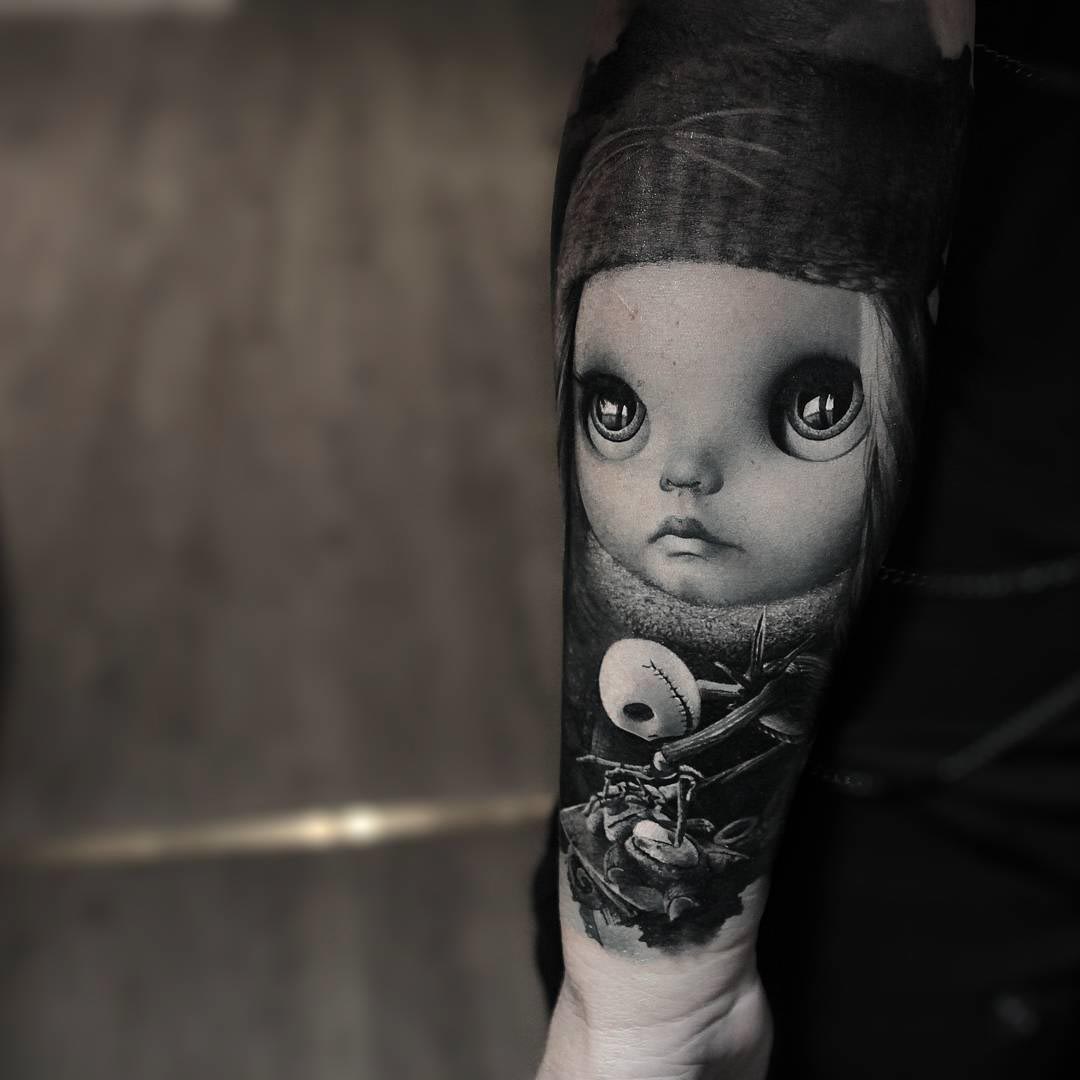 Jack and doll tattoo on arm