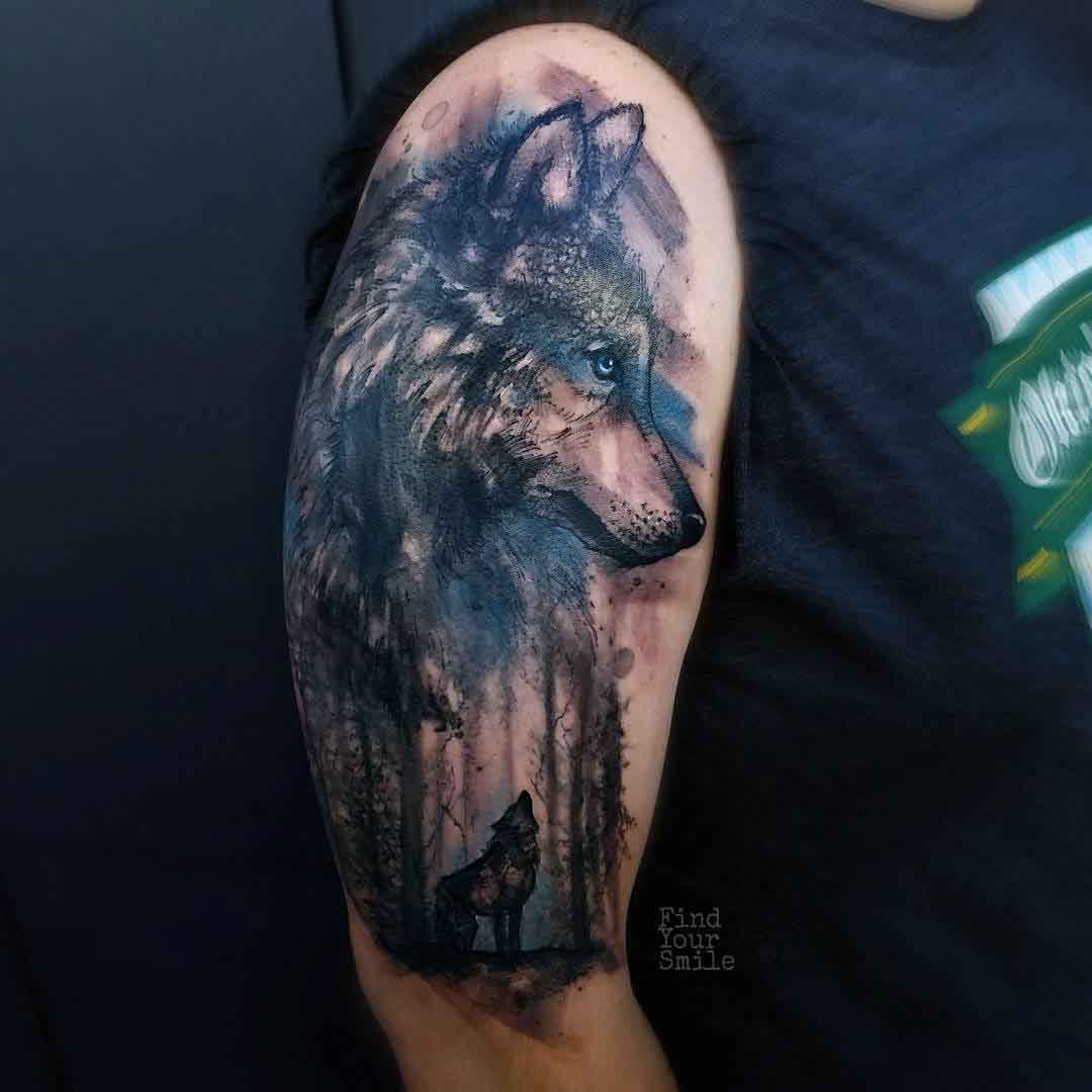 watercolor wolf tattoo on shoulder
