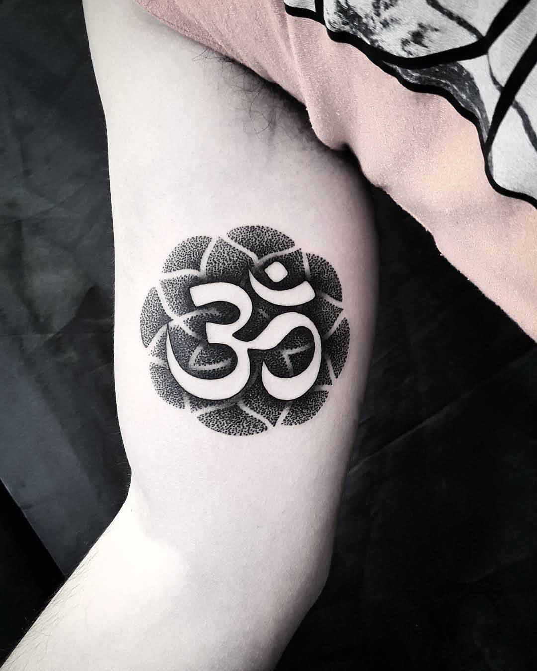 eastern dotwork tattoo on inner arm
