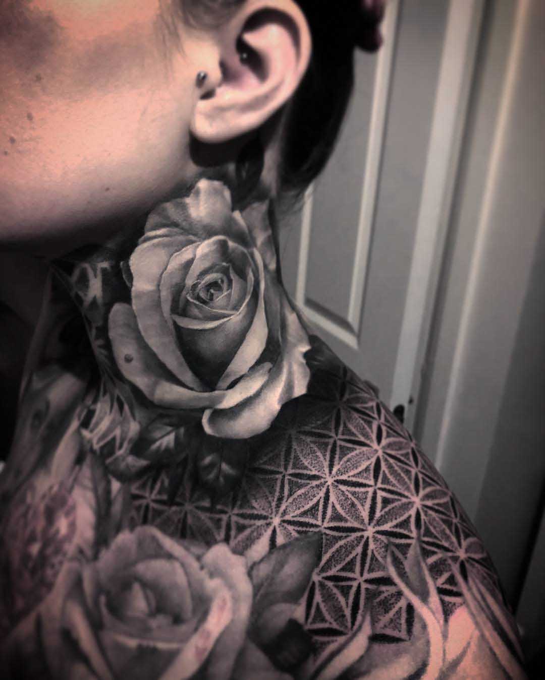 grey rose tattoo on neck