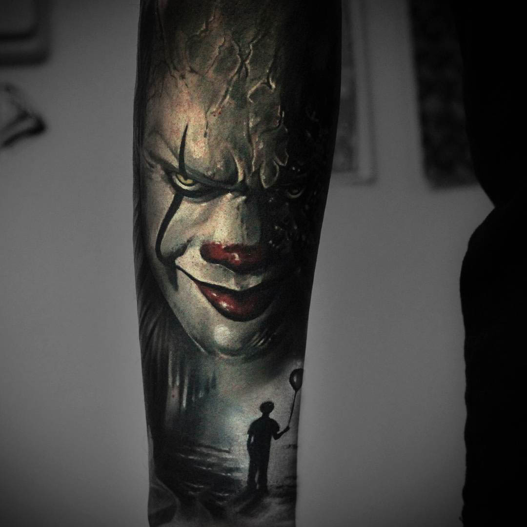 horror clown tattoo on arm Pennywise