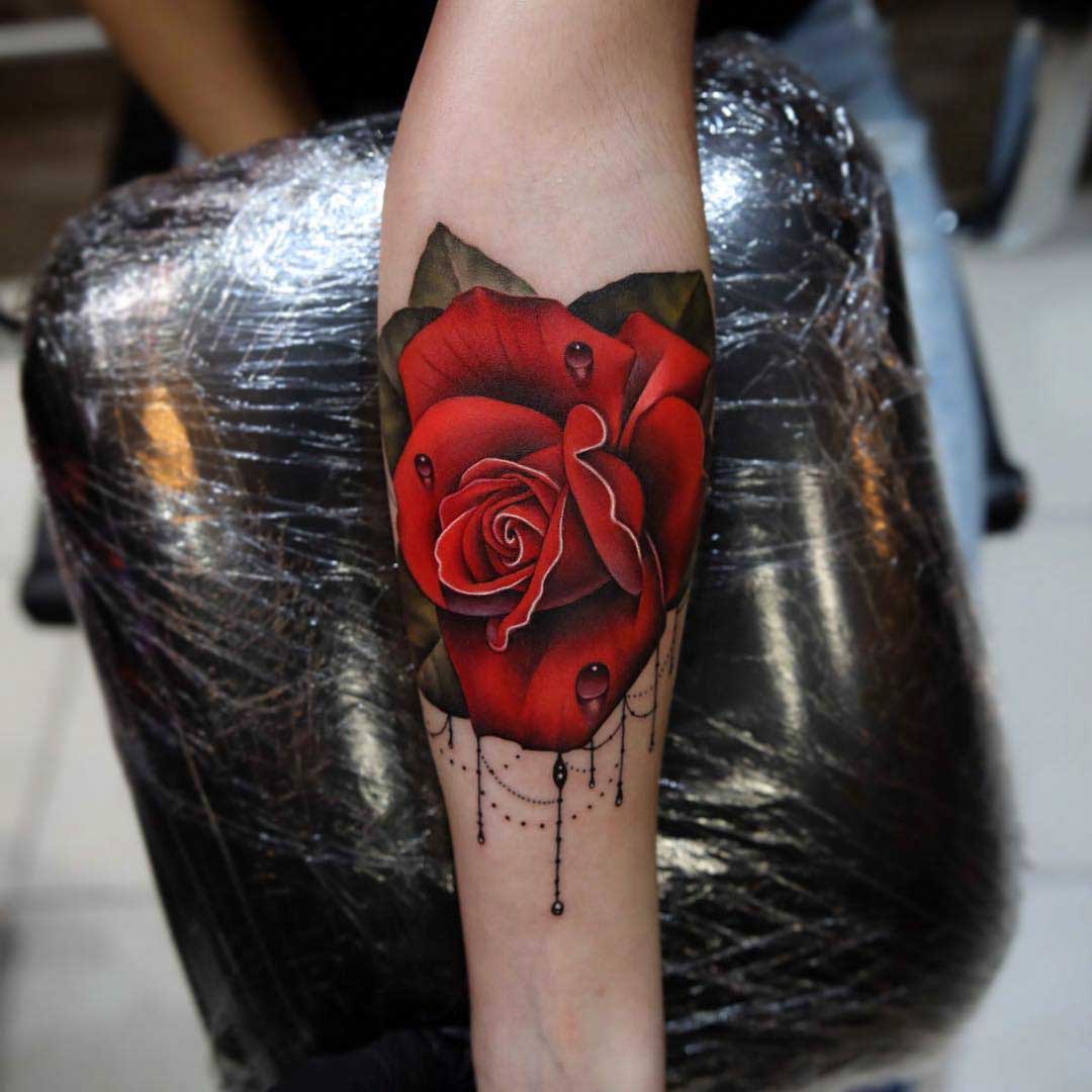 arm tattoo red rose