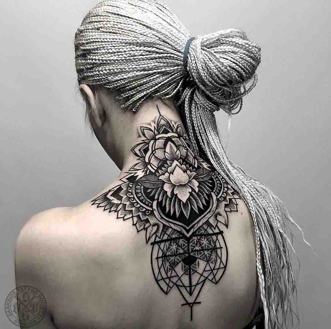 dotwork tattoo on back of neck