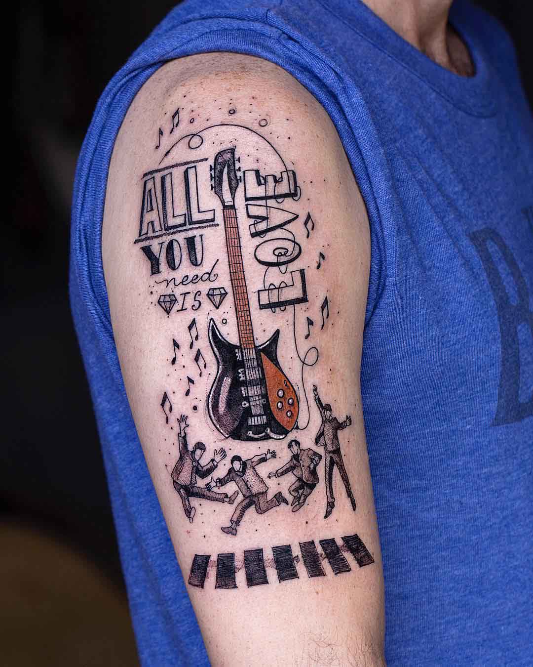 shoulder tattoo beatles guitar