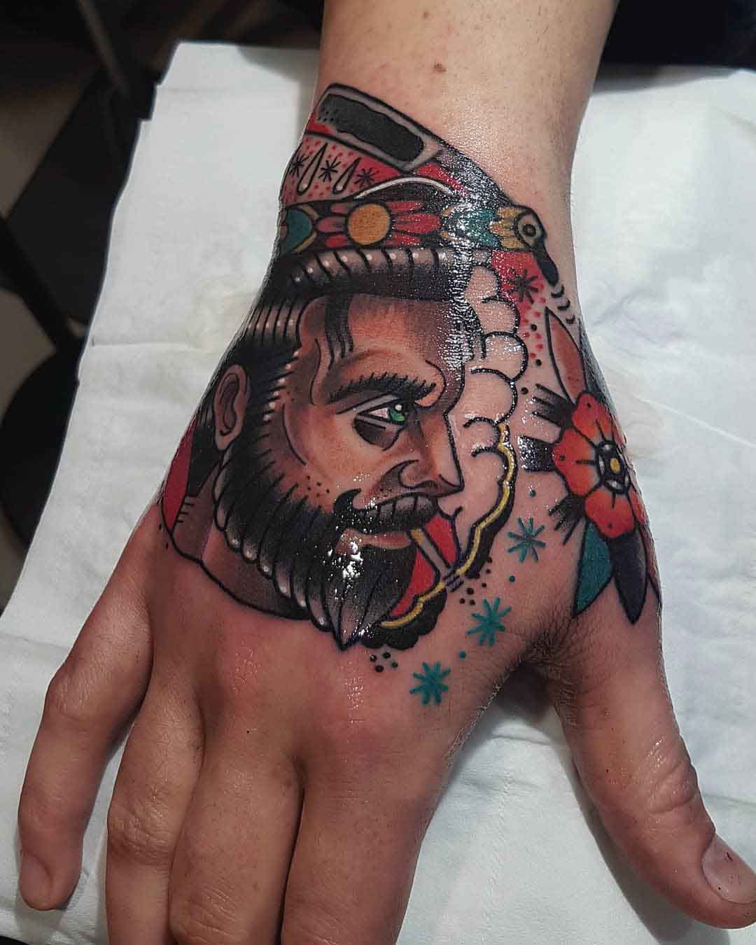 hand neo-traditional tattoo barber