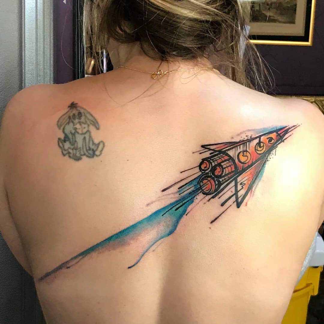 back tattoo rocketship