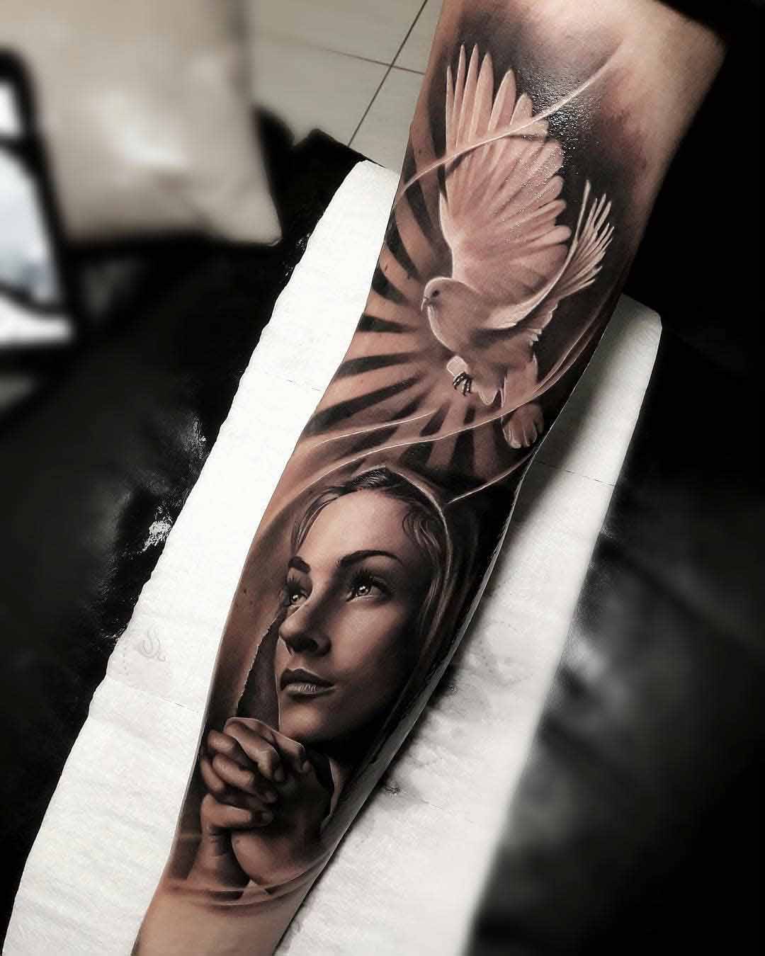 religious dove tattoo
