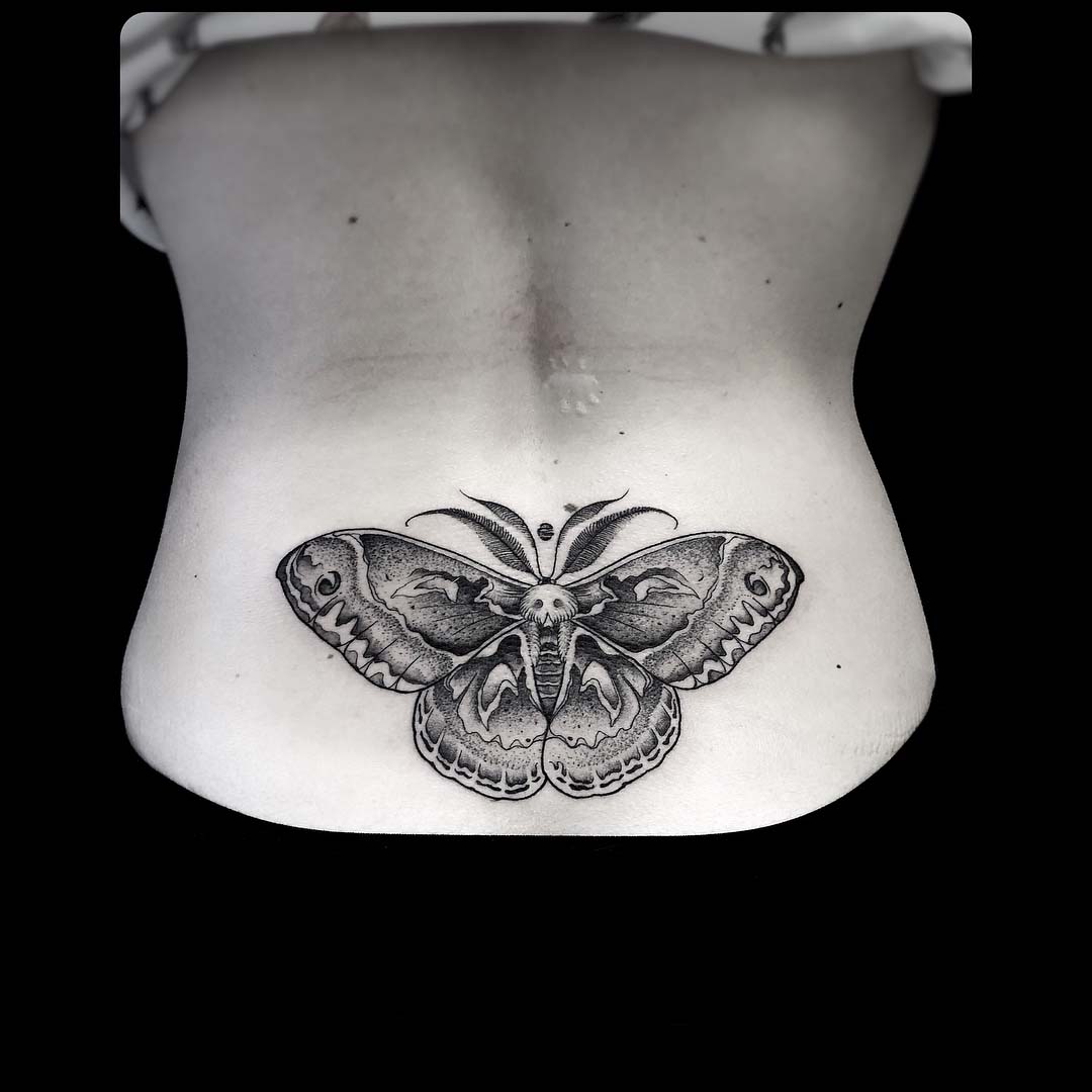 lower back tattoo moth