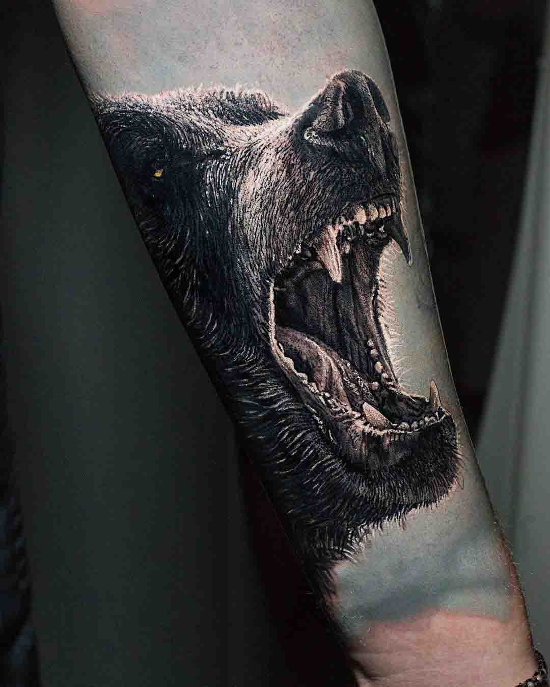 growling bear tattoo on arm