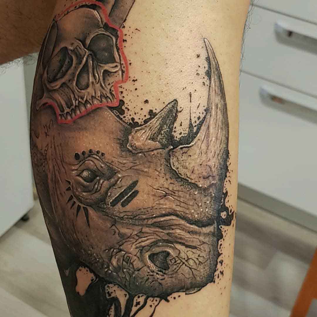 calf tattoo rhino