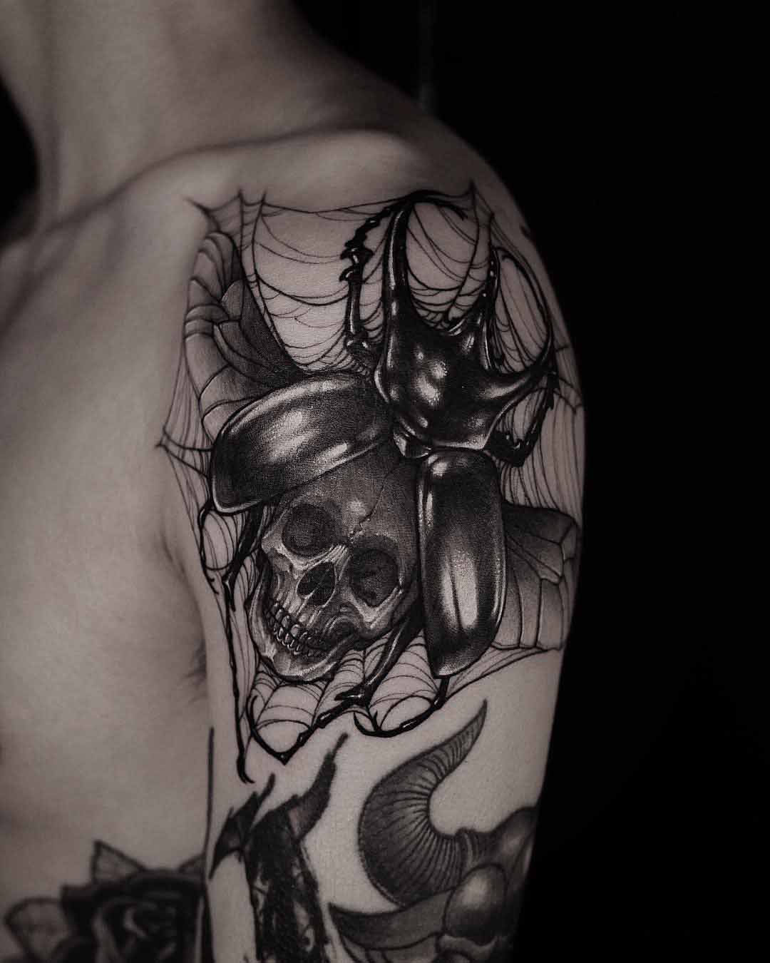 shoulder bug tattoo