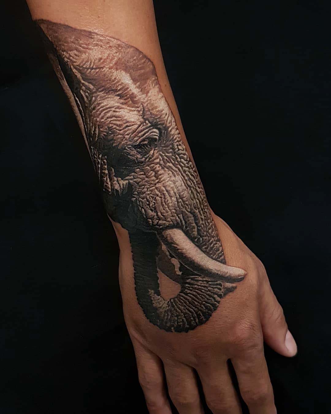 arm tattoo elephant