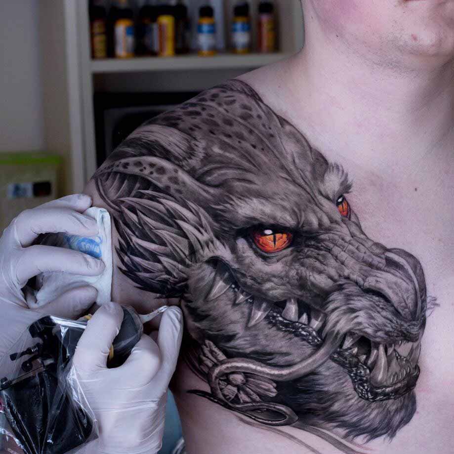 dragon tattoo on shoulder front