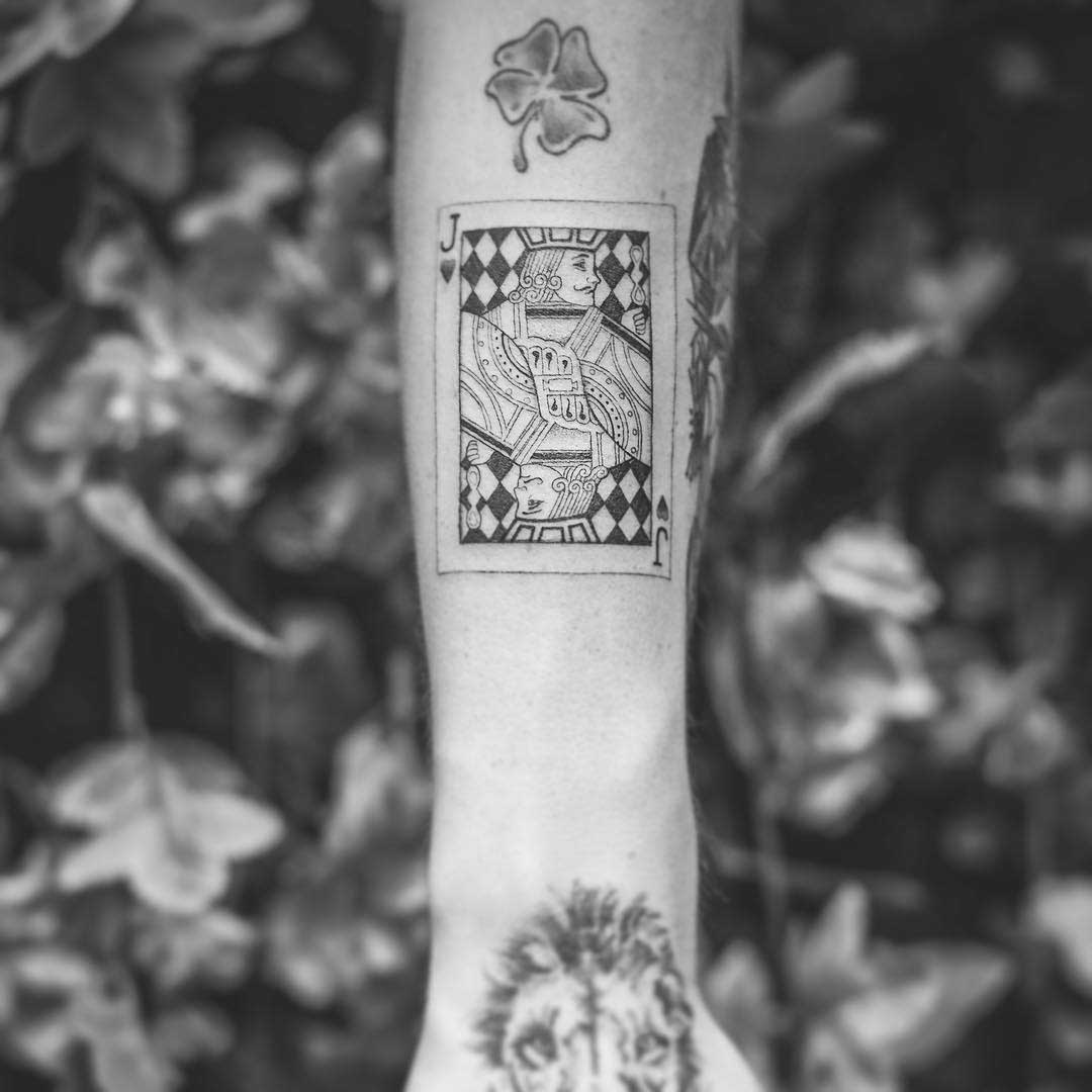 Jack of spades tattoo done on the wrist minimalistic