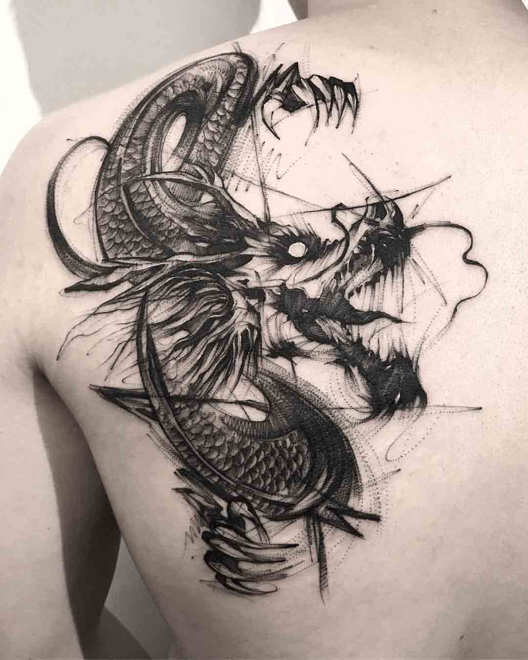 shoulder blade tattoo dragon